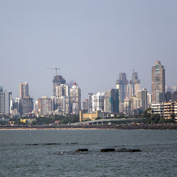 I am an NRI in the UAE. I plan to sell my flat in Mumbai. Will I be taxed?